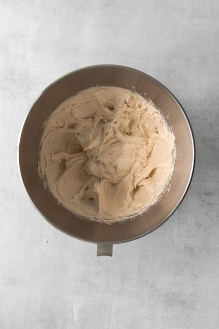 Cinnamon cream cheese frosting in a bowl