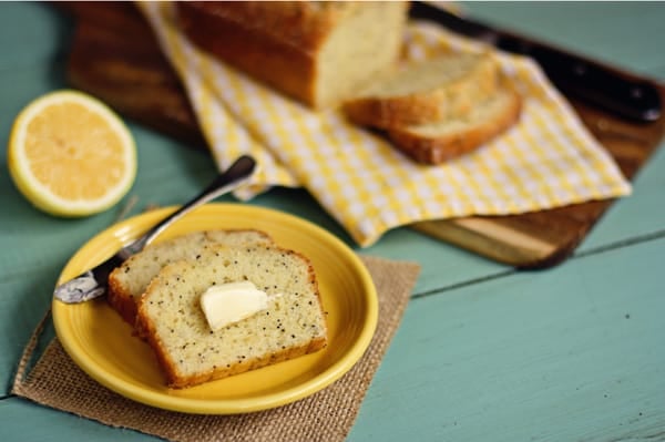 A Slice of Almond Poppy Seed Bread with Butter on Top