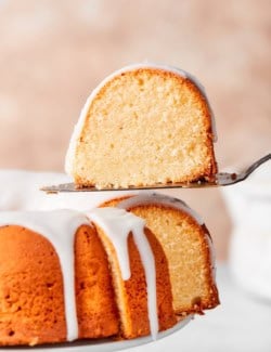 Slice of cream cheese pound cake on spatula.