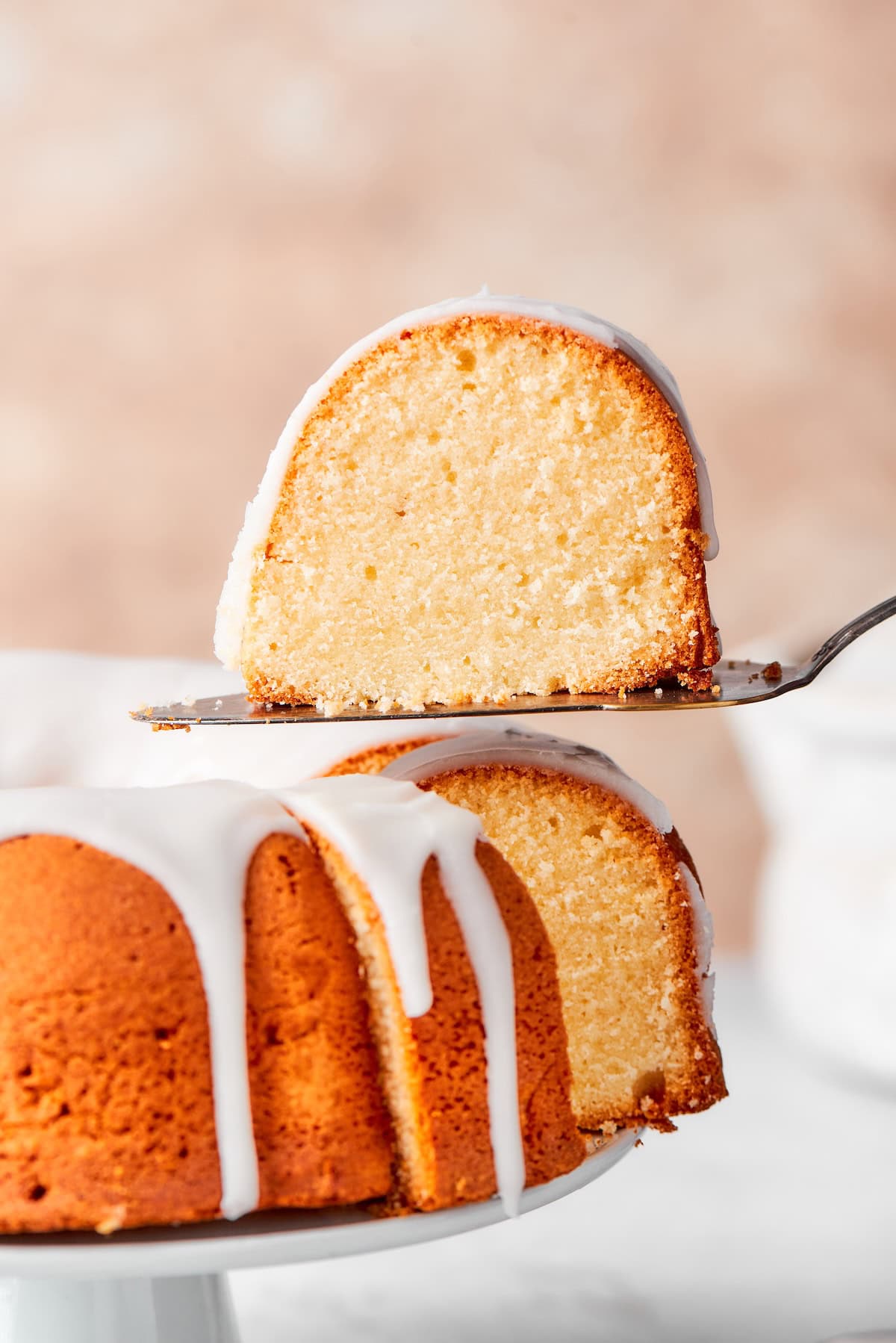 Slice of cream cheese pound cake on spatula.