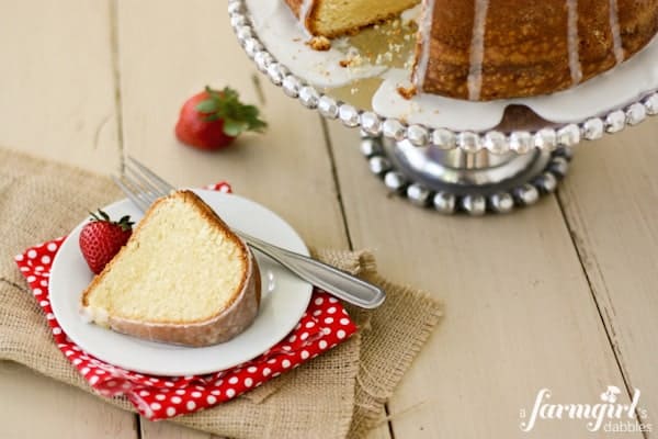 a slice of Cream Cheese Pound Cake on a white plate