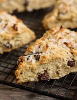 These scones are flaky and filled with sweet coconut and dark chocolate.