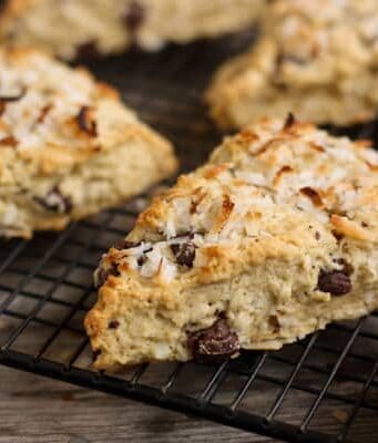 These scones are flaky and filled with sweet coconut and dark chocolate.
