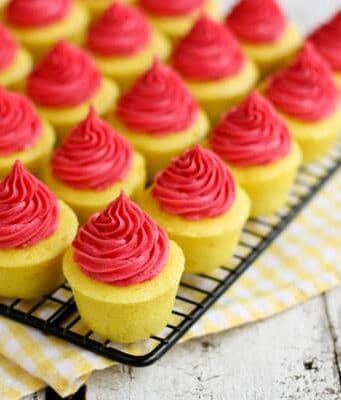 Mini Lemon cupcakes topped with Fresh Raspberry Buttercream