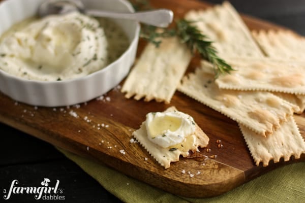 ricotta and honey spread on a cracker