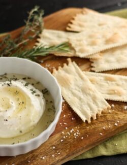 a dish of ricotta sprinkled with herbs