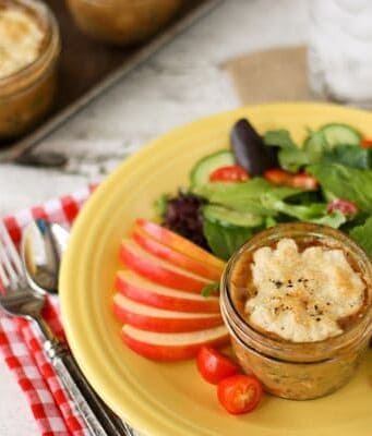 chicken pot pie dinner with apples and a side salad