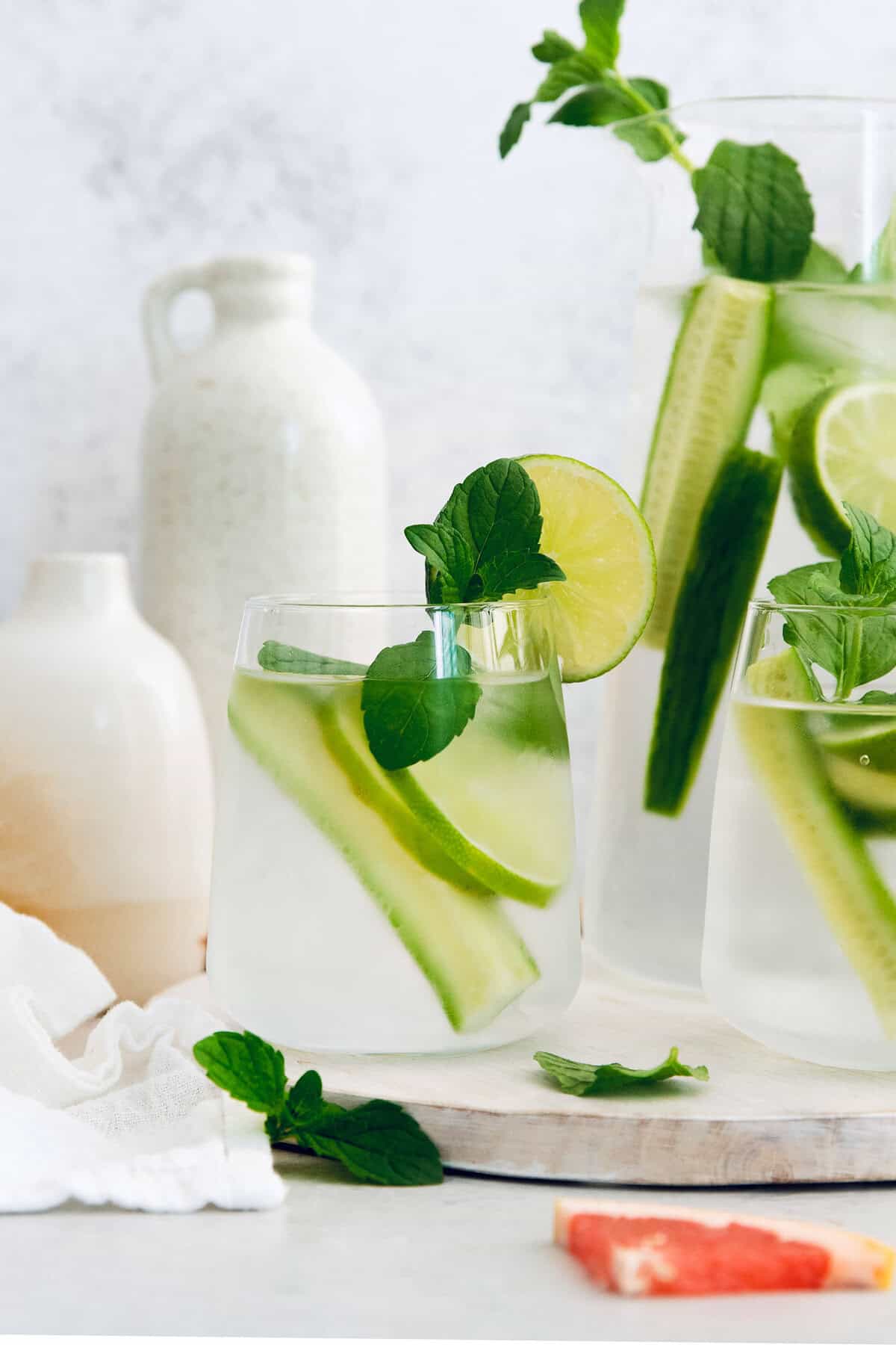 Cucumber, mint, and lame spa water in glass