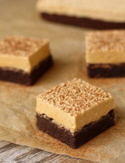 square pieces of Espresso Brownies topped with Peanut Butter Marshmallow Frosting