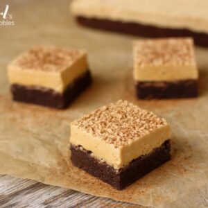 square pieces of Espresso Brownies topped with Peanut Butter Marshmallow Frosting