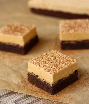 square pieces of Espresso Brownies topped with Peanut Butter Marshmallow Frosting