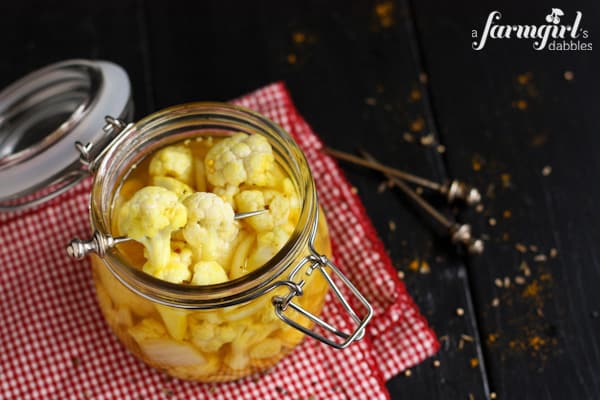 pieces of Pickled Cauliflower on a skewer