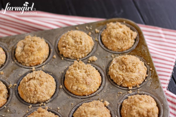 a pan of muffins topped with Cardamom Crunch Topping