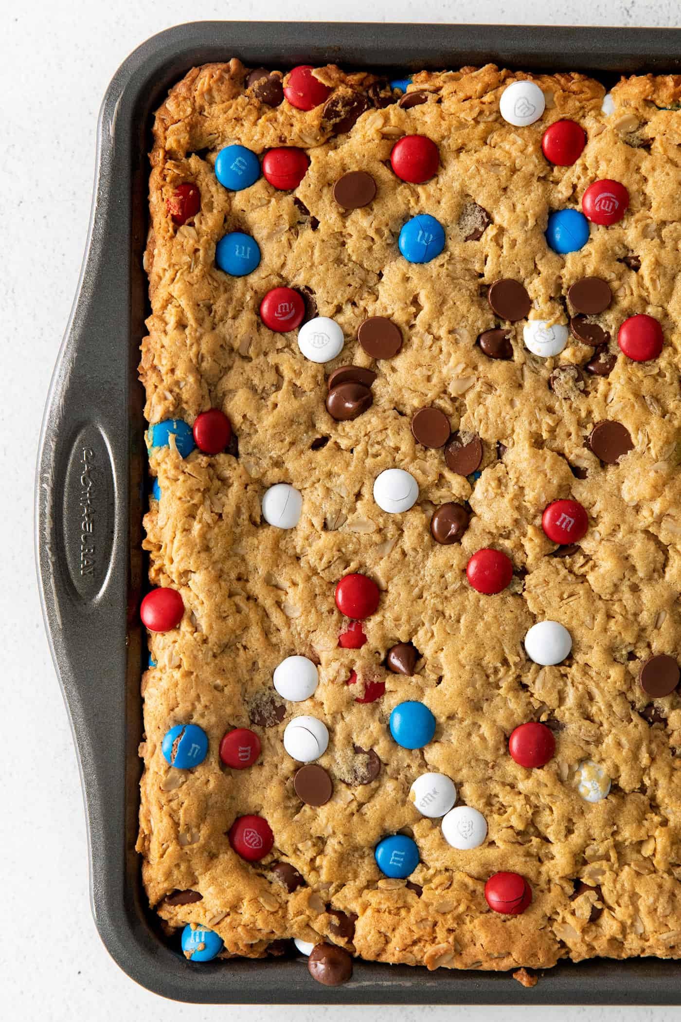 Patriotic monster cookie bars in a pan