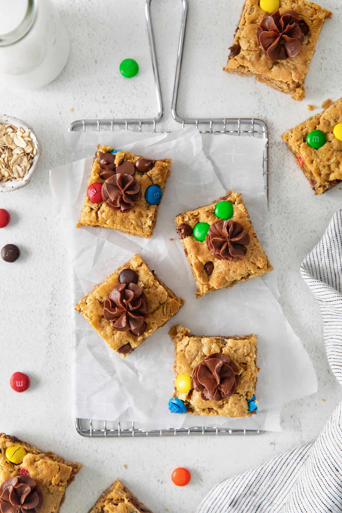 Overhead view monster cookie bars topped with chocolate icing