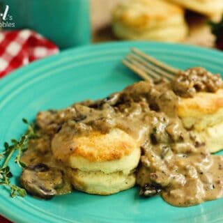 Biscuits with sausage and mushroom gravy on a plate