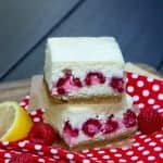 Lemon Cheesecake Bars with fresh raspberries