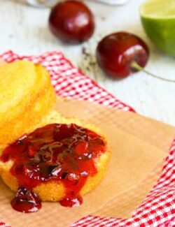 a cornbread muffin with Cherry Jam spread on top