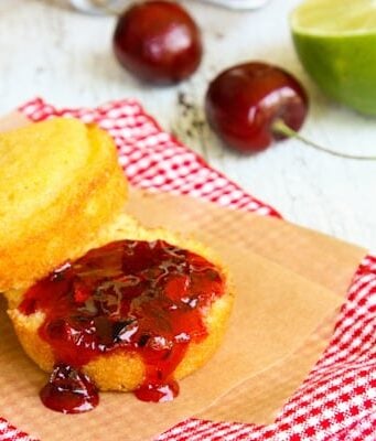 a cornbread muffin with Cherry Jam spread on top