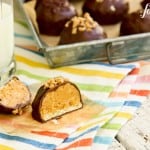 Peanut Butter Bonbons topped with toffee chips and sliced in half