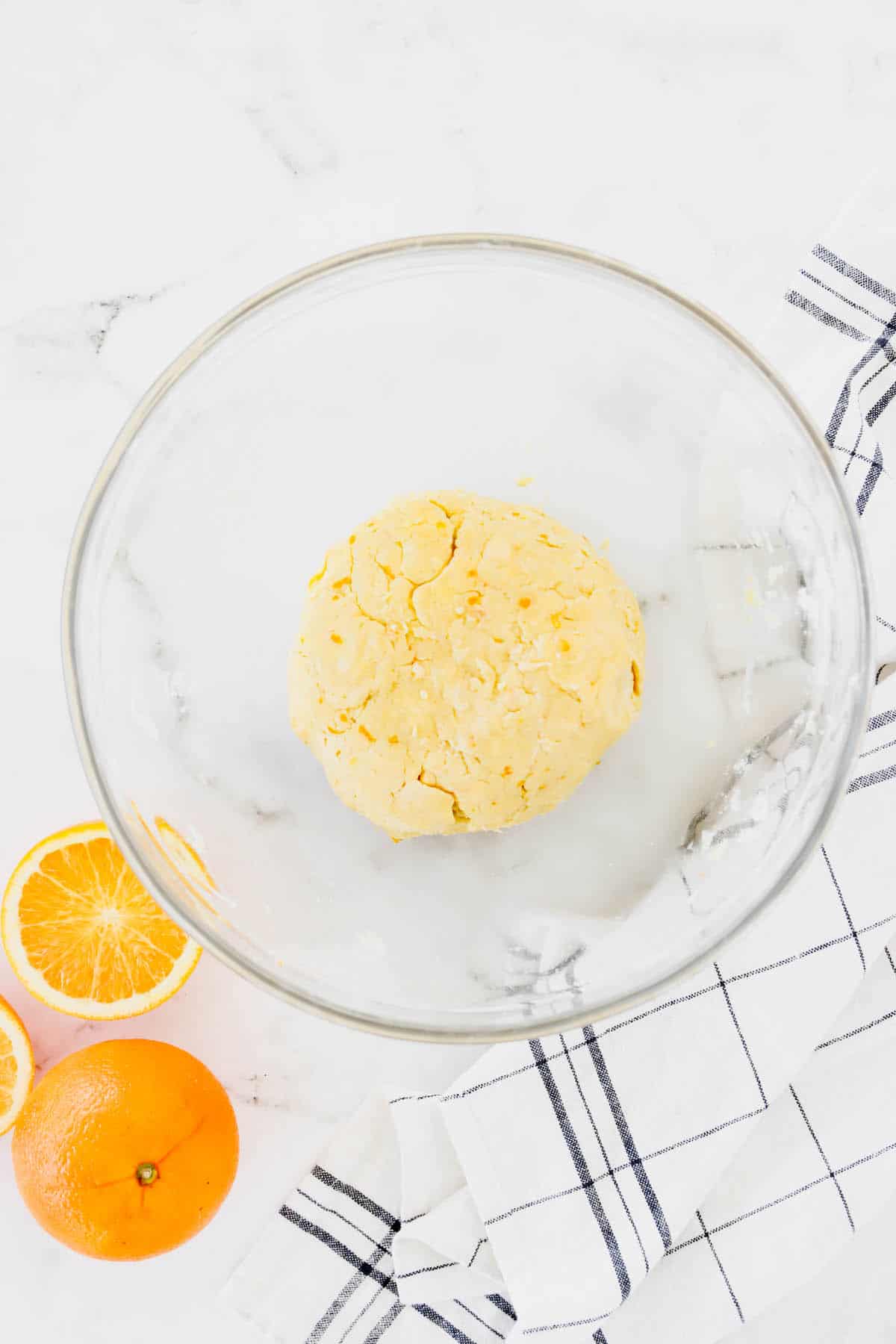 A ball of pastry dough in a bowl