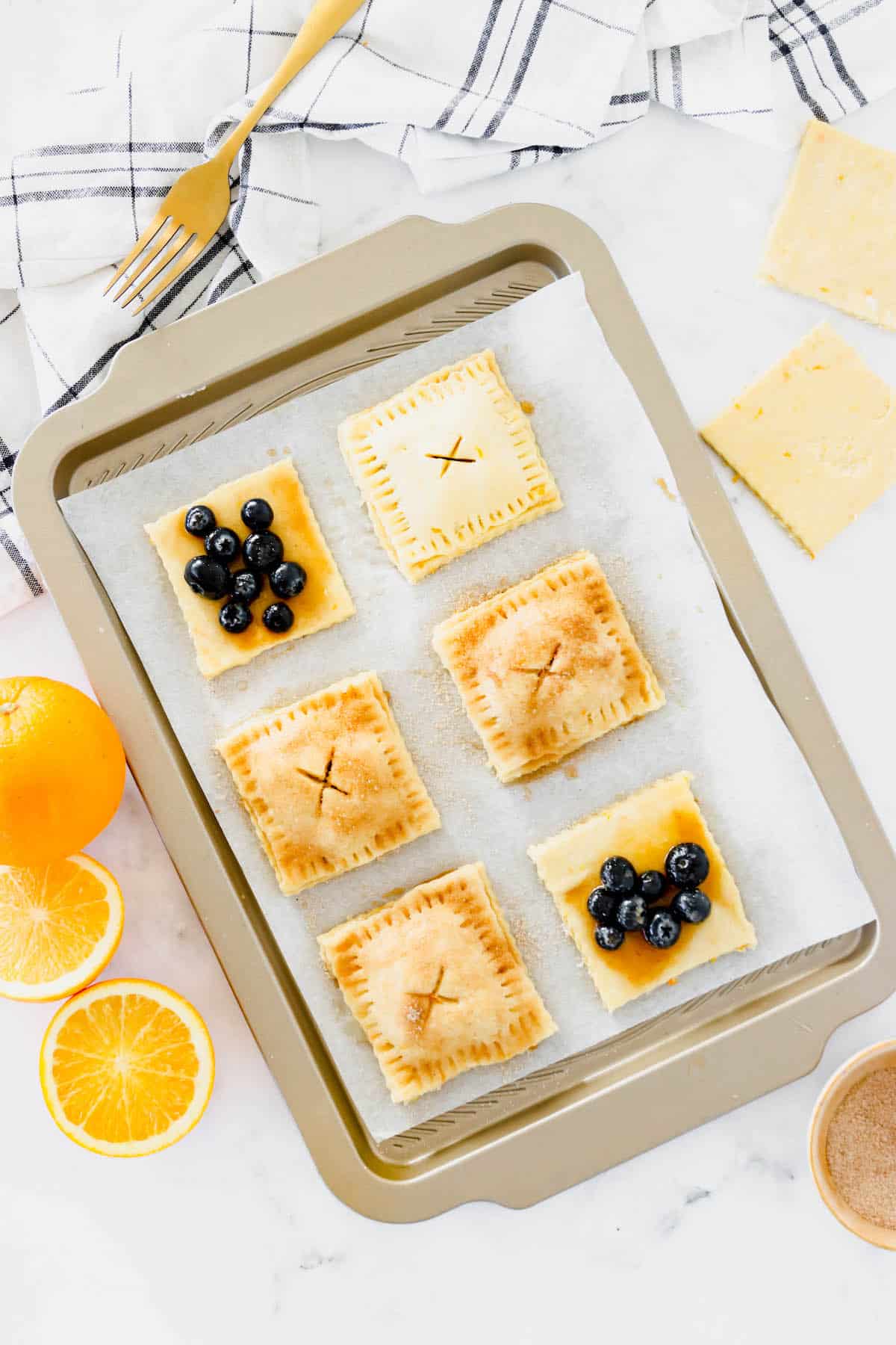 Process shot of making blueberry hand pies