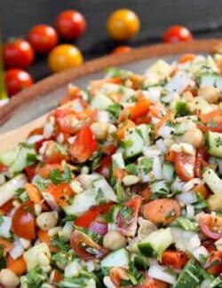 a large pottery bowl of Mediterranean Chopped Salad