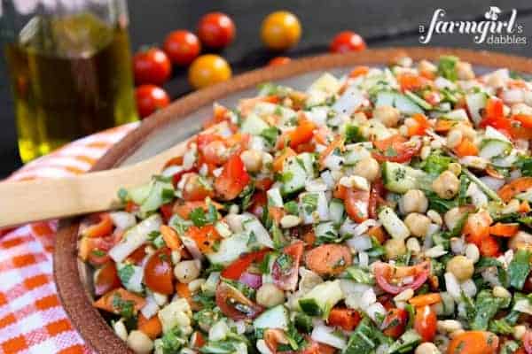 a large pottery bowl of Mediterranean Chopped Salad