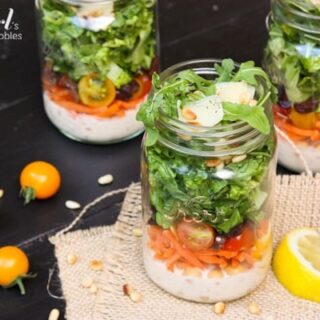 A jar of Italian Chopped Salad with dressing