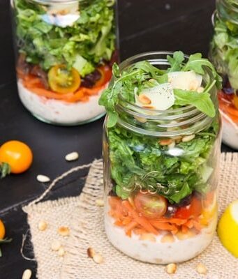 A jar of Italian Chopped Salad with dressing