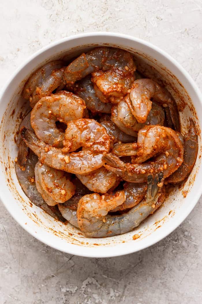 Bowl of shrimp in jerk marinade