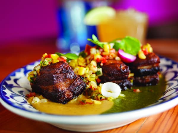 Crisp Pork carnitas with fresh corn salsa