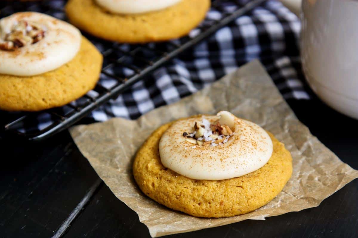 a Melt-In-Your-Mouth Pumpkin Cookie on brown parchment paper