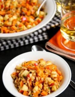 Farro Salad with Sweet Potatoes, Apples, and Chestnuts in a white bowl