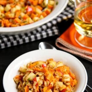 Farro Salad with Sweet Potatoes, Apples, and Chestnuts in a white bowl