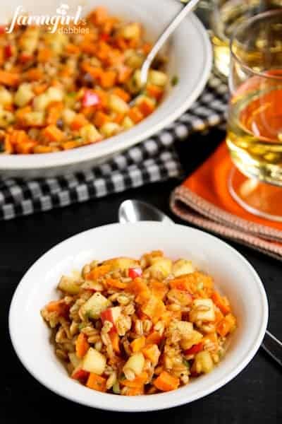 Farro Salad with Sweet Potatoes, Apples, and Chestnuts in a white bowl