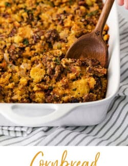 A wooden spoon serving cornbread dressing