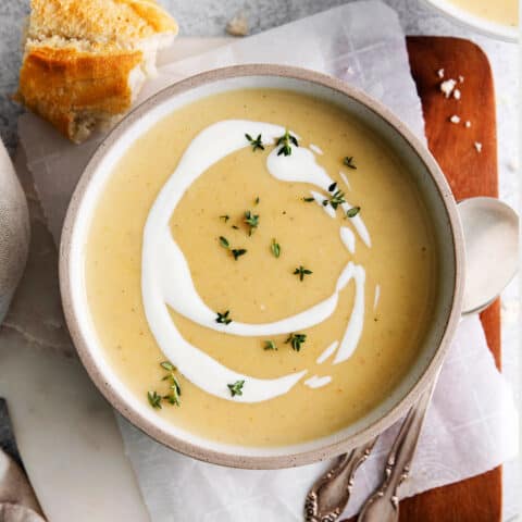 Overhead view of a bowl of creamy potato soup