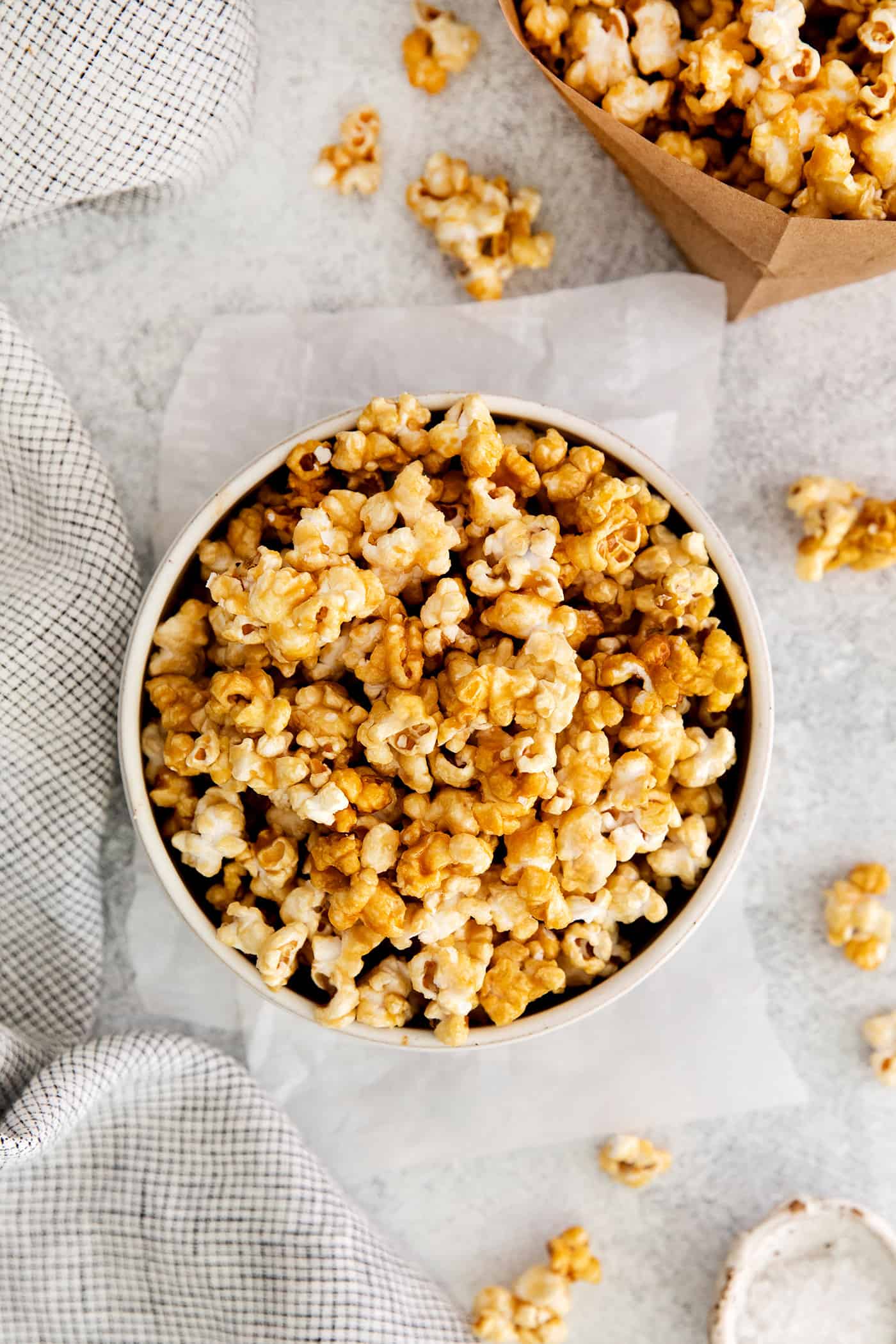 Overhead view of a bowl of caramel popcorn