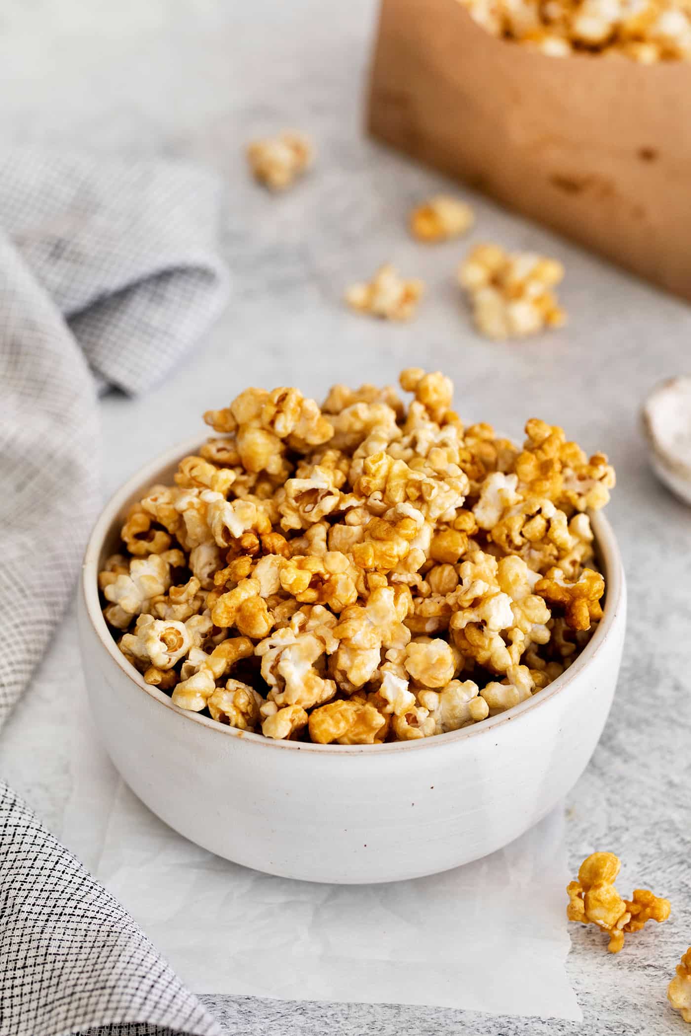 Angled view of a bowl of caramel popcorn