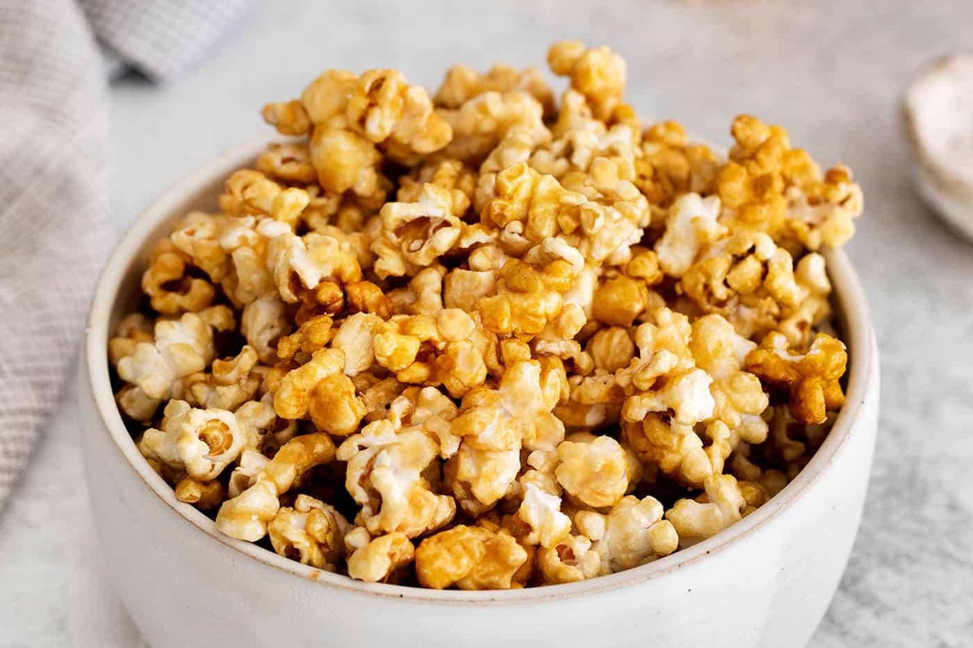 Close up of a bowl of caramel popcorn