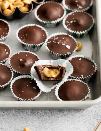 Homemade peanut butter cups on a baking sheet