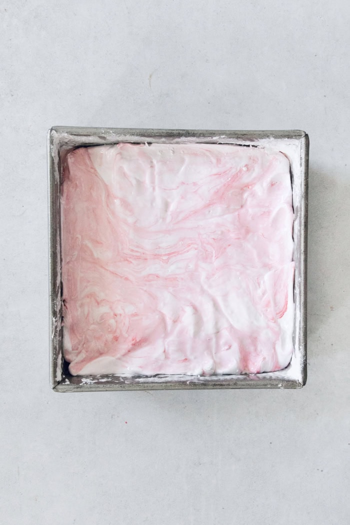 Peppermint marshmallows in pan before slicing.