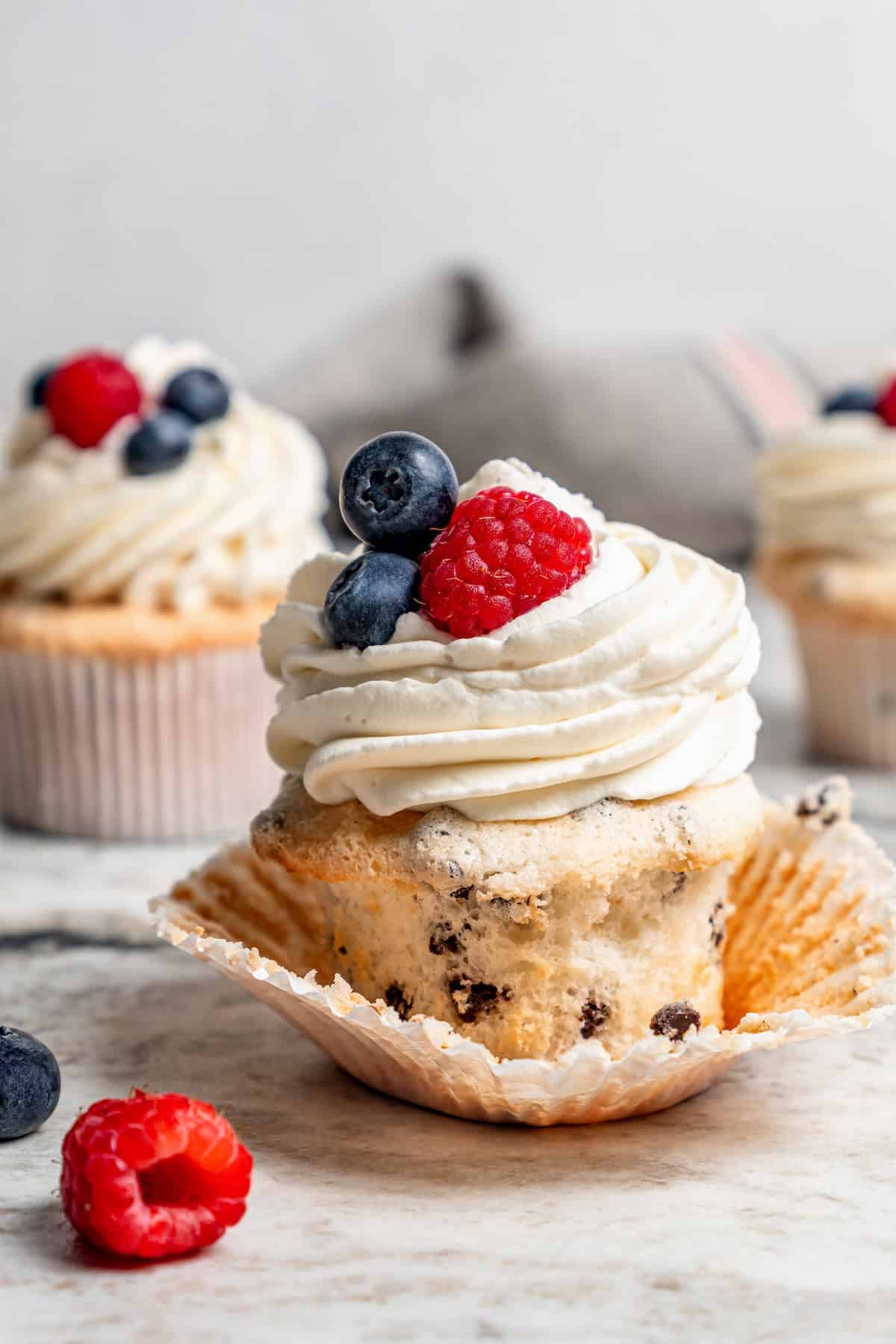 Chocolate chip angel food cupcake with paper wrapper pulled off
