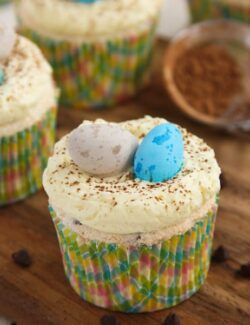 These angel food cupcakes are filled with chocolate chips, topped with buttercream icing, and decorated with Easter candy.