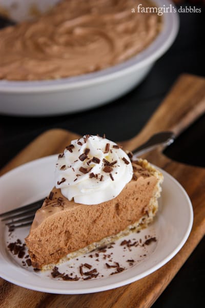 A slice of Chocolate French Silk Pie on a white plate