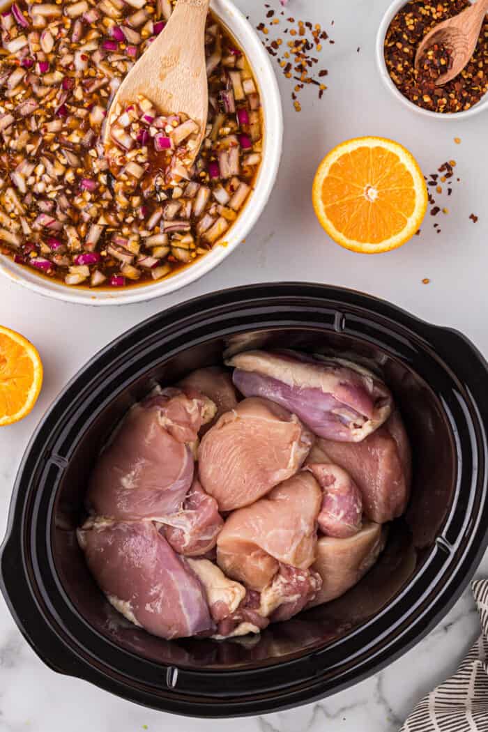 Chicken thighs and breasts in a slow cooker