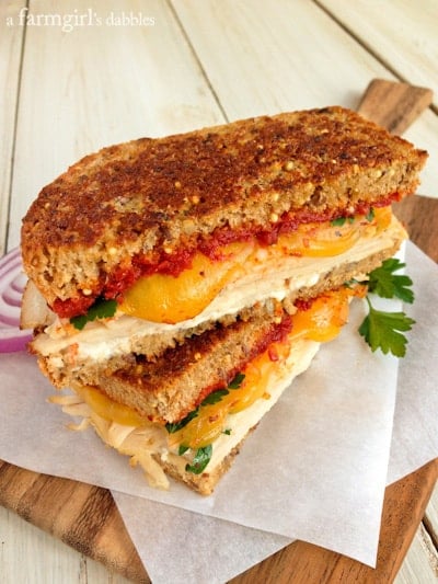 Herby Turkey Grilled Cheese Sandwich cut  in half and stacked on top of each other