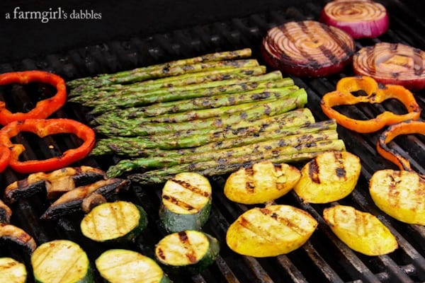 a variety of vegetables on the grill