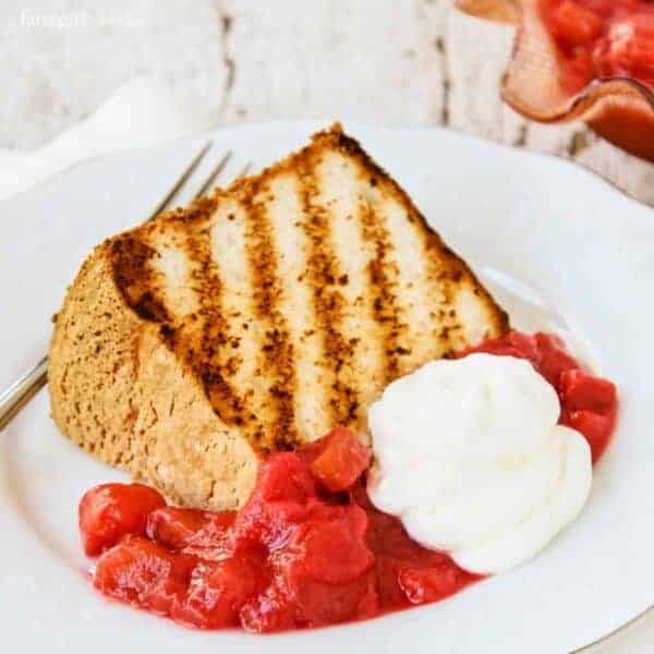 Grilled Angel Food Cake with Rhubarb Sauce on a Plate